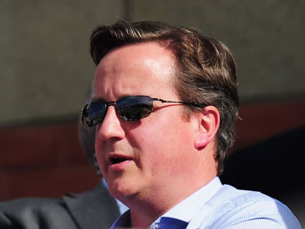 British PM David Cameron auctions bat signed by Sachin Tendulkar British PM David Cameron auctions bat signed by Sachin Tendulkar