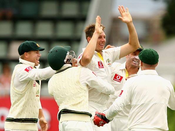 Australia on top as rain curtails first day's play