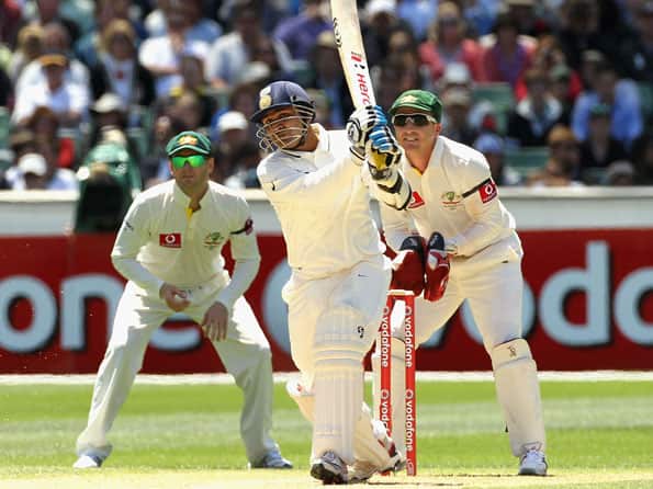 Sehwag half-century leads solid India reply on second day