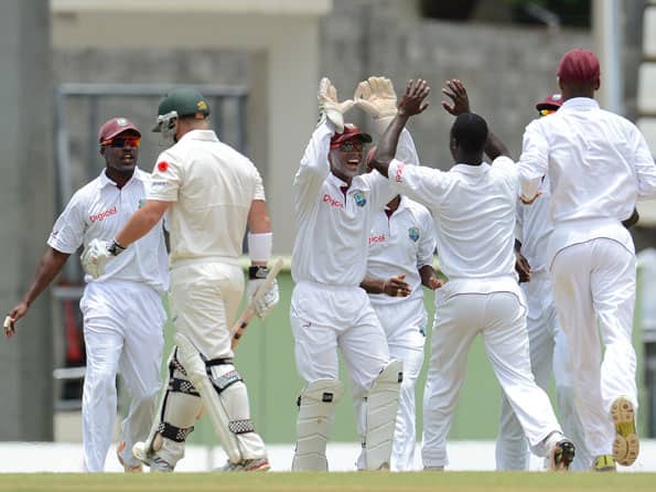 West Indies fight back as Australia lose David Warner