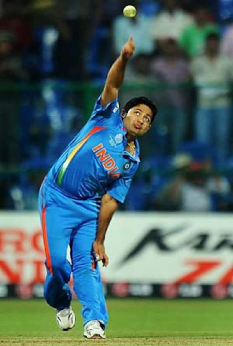 Dhoni wants Chawla to contribute with bat too