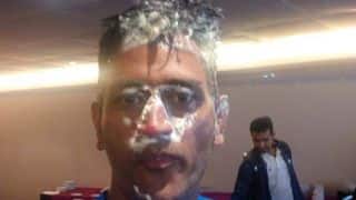 Dhoni posts photo of his face smeared with cake