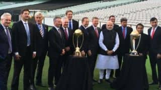Narendra Modi poses with ICC Cricket World Cup trophy