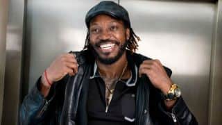 Watch Manchester United fan Chris Gayle sing from Anfield Stands during his side's tie against Liverpool
